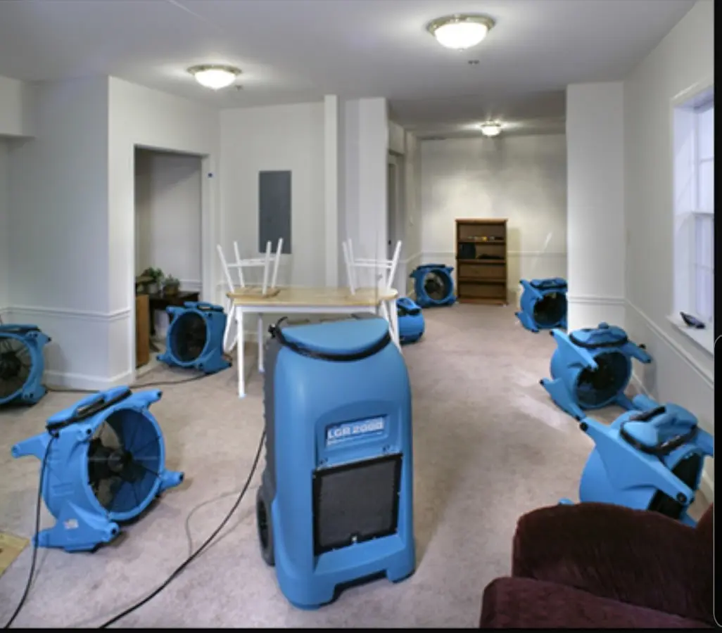 Air movers and dehumidifier setup for Water Damage Restoration in Rosaryville